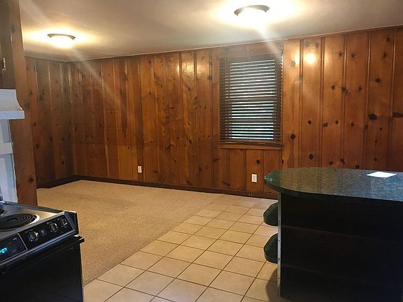 Kitchen opens into living room