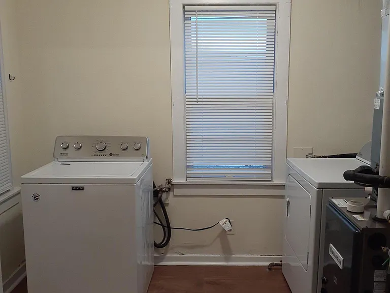 laundry room with included washer and dryer