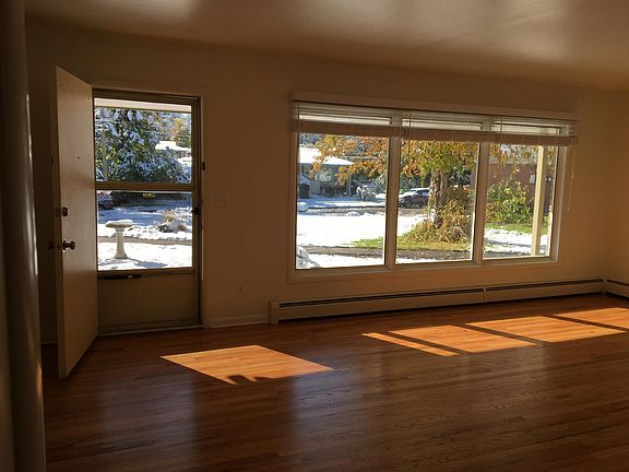 Your living room view with refurbished hardwoods