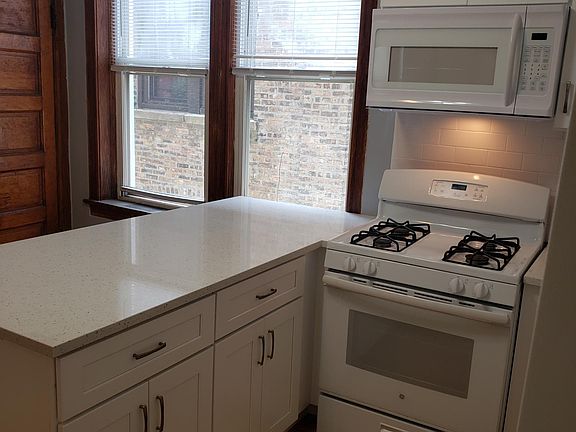 lots of cabinet space and room for two bar stools