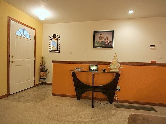 Main Entry with Stairway Leading to Lower Level
