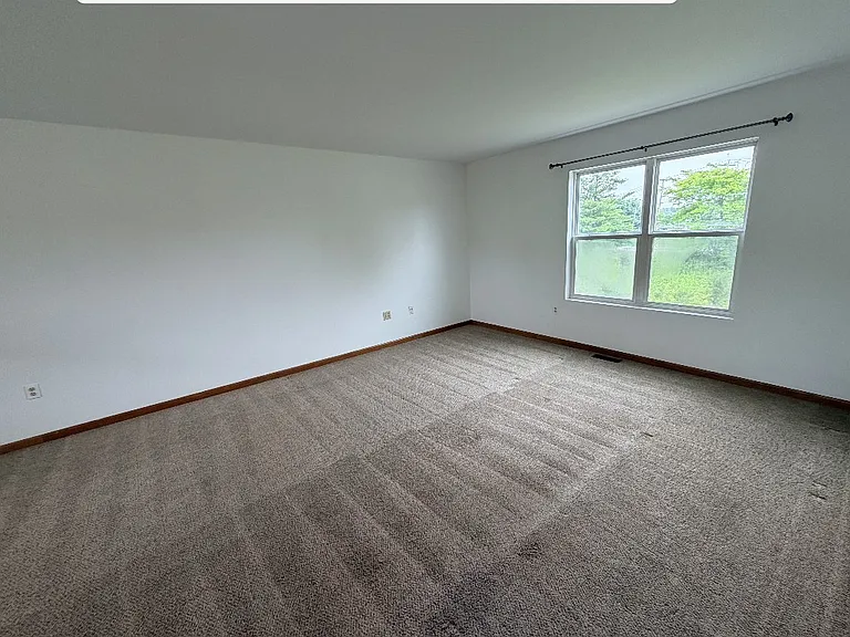Living room and rear window