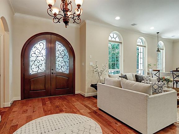 Beautiful entryway with hand scraped wood floors.