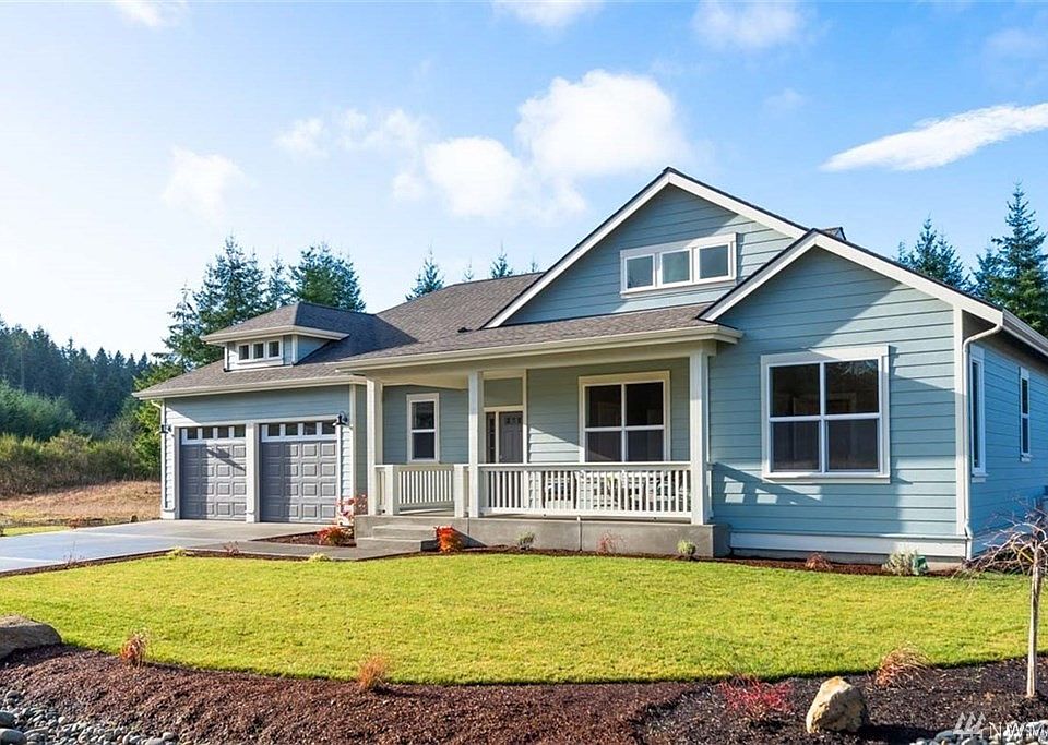 PHOTO OF SIMILAR HOME ON NEARBY LOT>