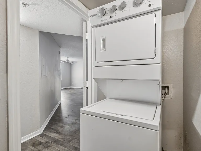 Dedicated laundry closet with washer and dryer connections inside a 3-bedroom, 2-bath apartment at Gregory Cove in Jacksonville, FL.