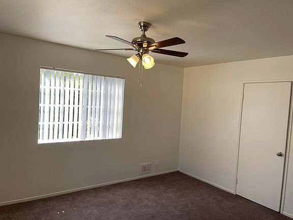 first bedroom is large and has a walk in closet