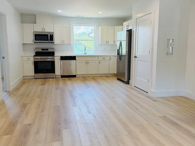 living, kitchen dining area