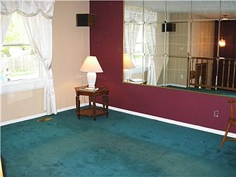 Living Room With Mirrored Wall