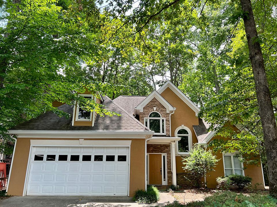 3 bed/2.5 bath with master on main and two car garage on quiet cul-de-sac