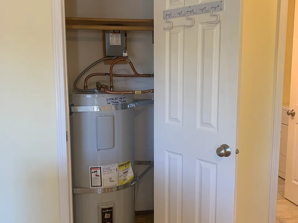 Hot water closet and broom closet storage