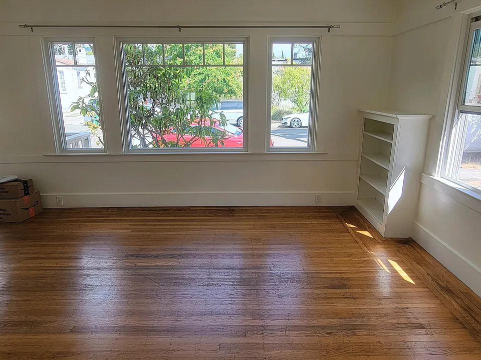 Living/dining looking out to the street. Lots of natural light.