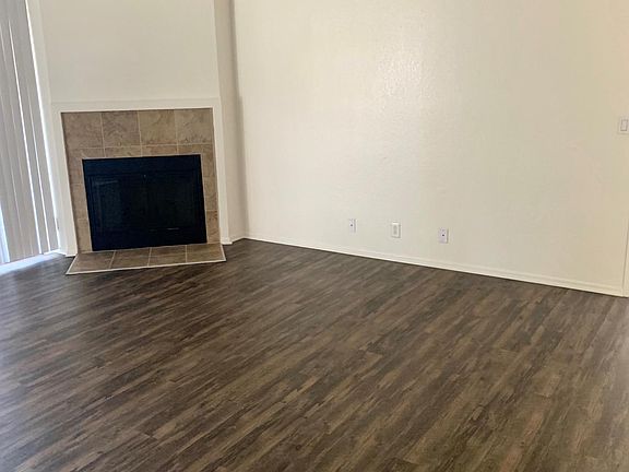Living Room with Wood Burning Fireplace