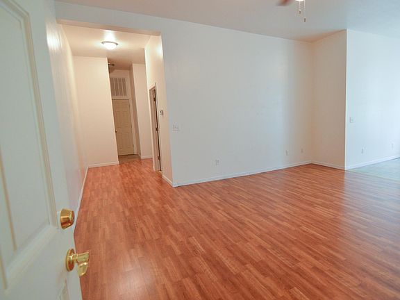 Living room with hallway to bedrooms