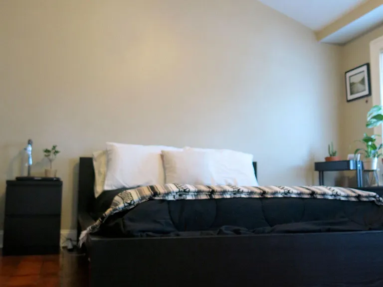 3rd floor bedroom with vaulted ceiling