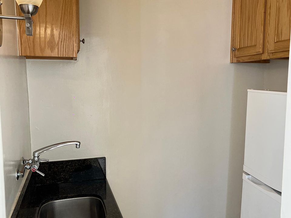 Kitchenette (No Stove or Microwave) With refrigerator.