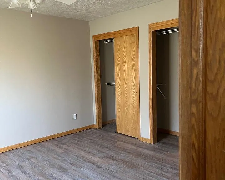 Main floor Bedroom with door to bathroom - Double closet. Across from washer and dryer room.