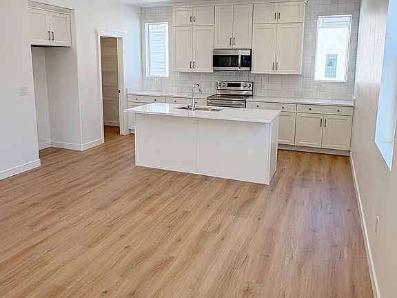 3rd image of 923 W Coalburn Way #101/65