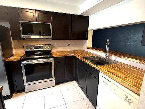 2nd image of 3082 S Oakland Forest Drive #1306