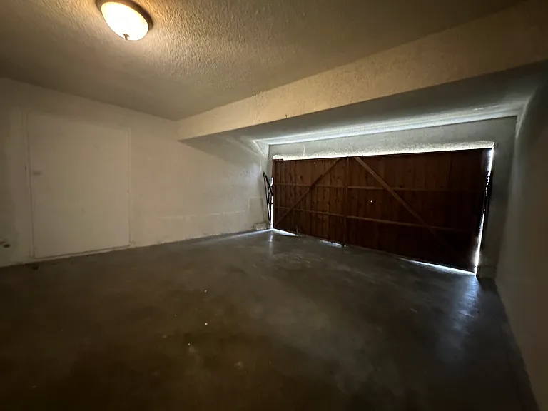 Very large oversize garage fits two cars very well