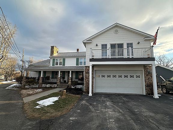 Two car garage and balcony. 