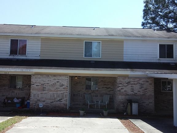 Front of house, fresh paint, large driveway, quiet neighbors