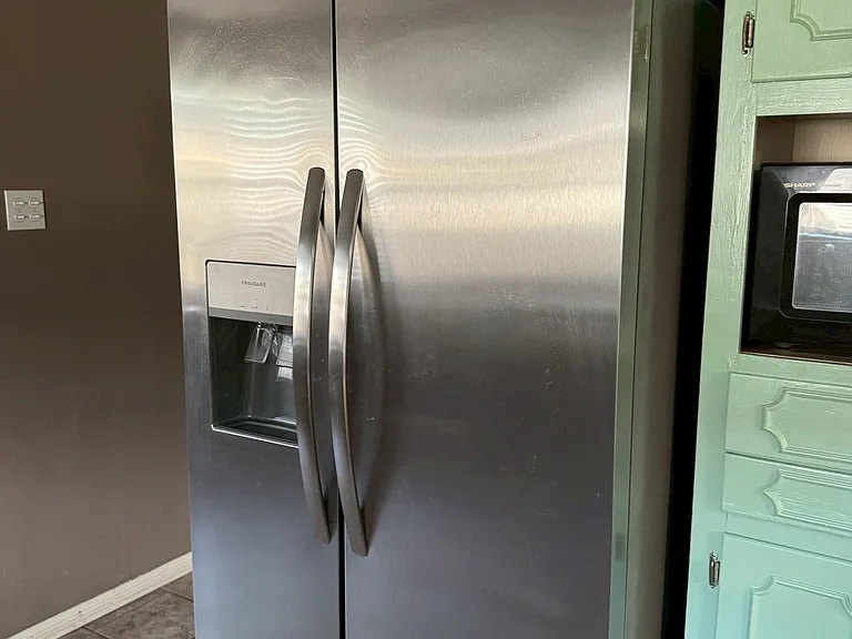 __ Refrigerator
"Brand-new stainless steel refrigerator _ clean, energy-efficient, and spacious for all your groceries."