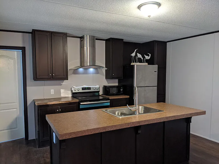 Modern kitchen with stainless steel appliances