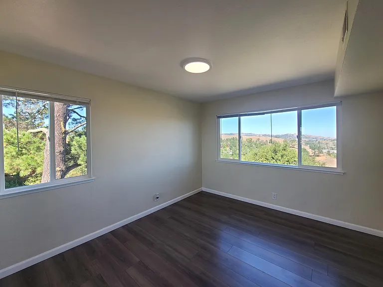 Primary Bedroom with Mountain Views and Lots of Natural Light
