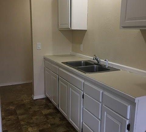 Kitchen has an adjacent dining area, not shown