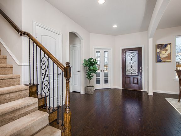 Welcoming foyer entry with recessed lighting