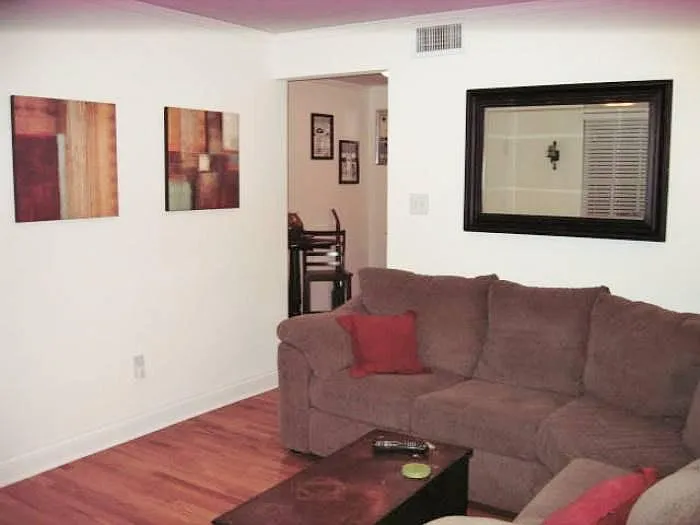 Inviting Livingroom. Classic Oak Wood Flooring Throughout. Everything Is Freshly Painted (inside and outside).