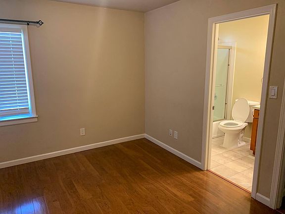 Back bedroom with connecting bathroom