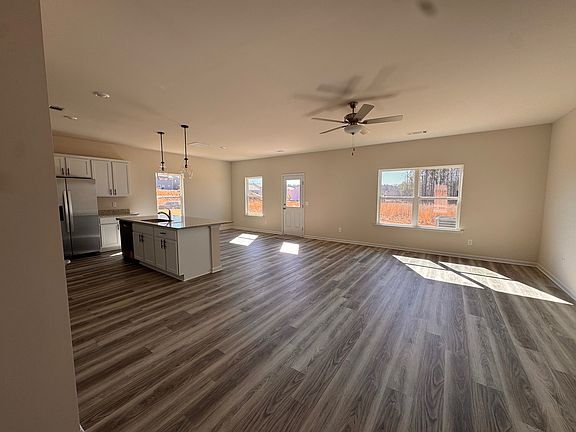 big open floor living room + kitchen