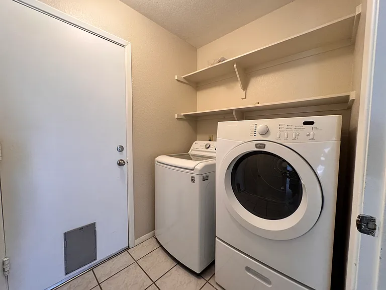 Inside laundry includes washer and dryer