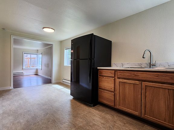 Recently updated kitchen with new cabinets and countertops.