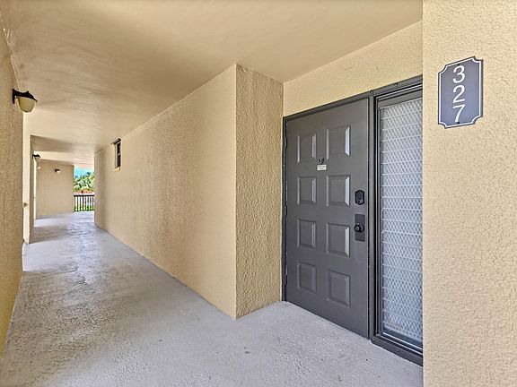 5th image of 5250 Woodland Lakes Drive #327