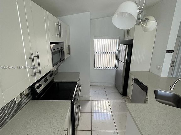 3rd image of 9999 Summerbreeze Dr APT 212