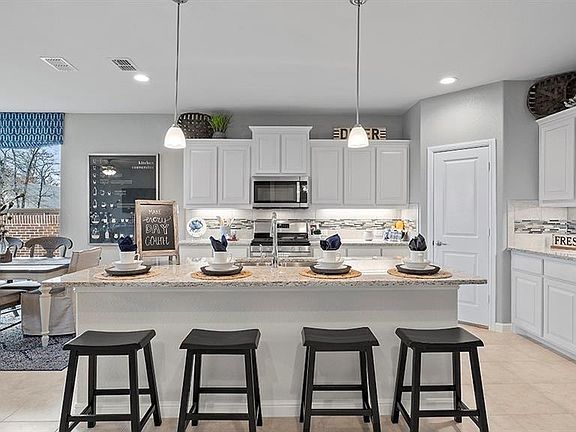 Photos shown here may not depict the specified home & features included are for illustration purposes only.