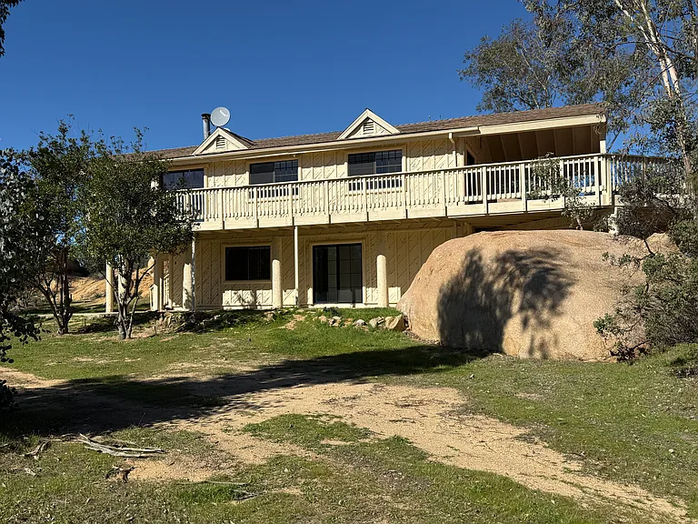 Left side of the house facing the Macadamia nut grove