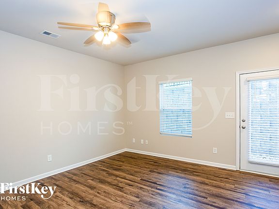 3rd image of 10724 Rivergate Dr NW