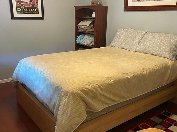 Bedroom with closet on right side