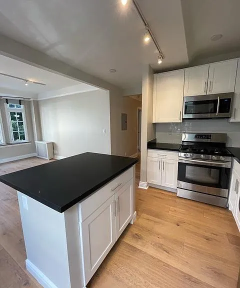 Nob Hill Place ~ Newly renovated residences! ~ Elegant quartz counters, custom white cabinetry, track lighting, designer wood flooring, stainless steel appliances, gas stove, dishwasher, built in microwave, natural lighting, spacious layouts