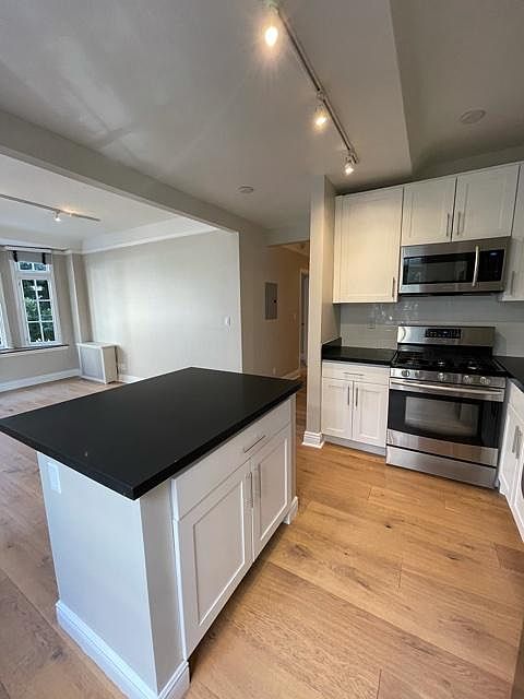 Nob Hill Place ~ Newly renovated residences! ~ Elegant quartz counters, custom white cabinetry, track lighting, designer wood flooring, stainless steel appliances, gas stove, dishwasher, built in microwave, natural lighting, spacious layouts