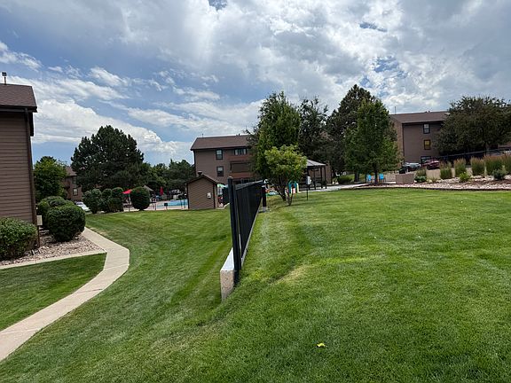 Lush green lawn area for relaxing, playing with kids or dog.