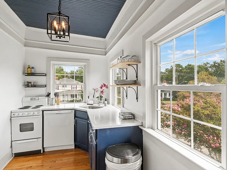 Fully equipped kitchen with stove, dishwasher, fridge, coffee maker, microwave and basic cooking amenities!
