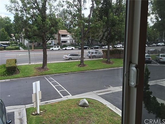 Look out to the front street and parking spaces right in front your unit