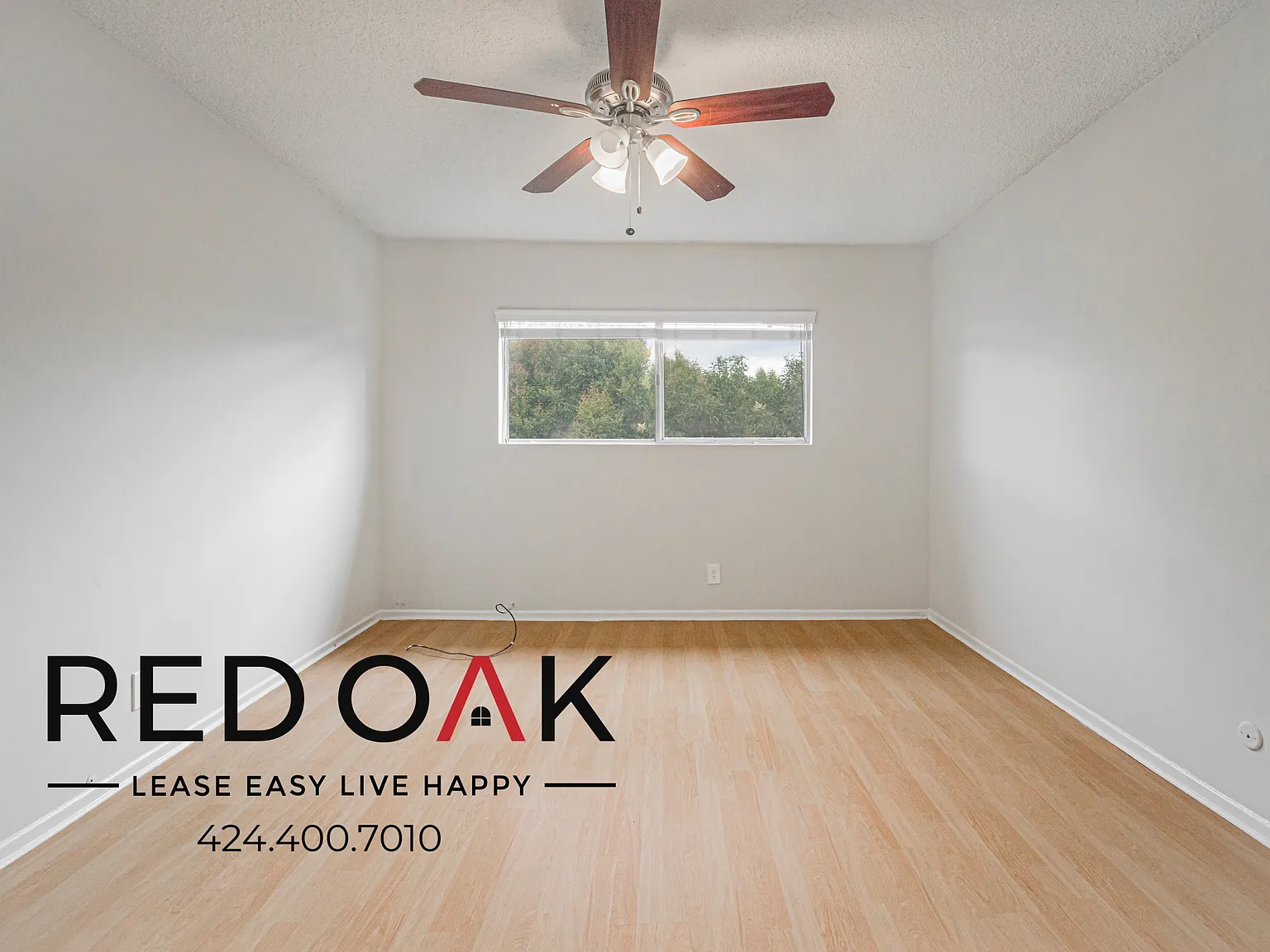 ~Spacious 2-Bed/1.5-Bath with Parking Included, Beautiful Hardwood Floors, and On-Site Laundry in... — Photo 3