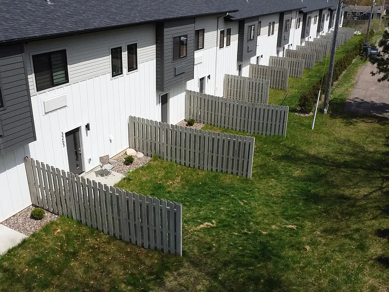 All units side by side with yard space