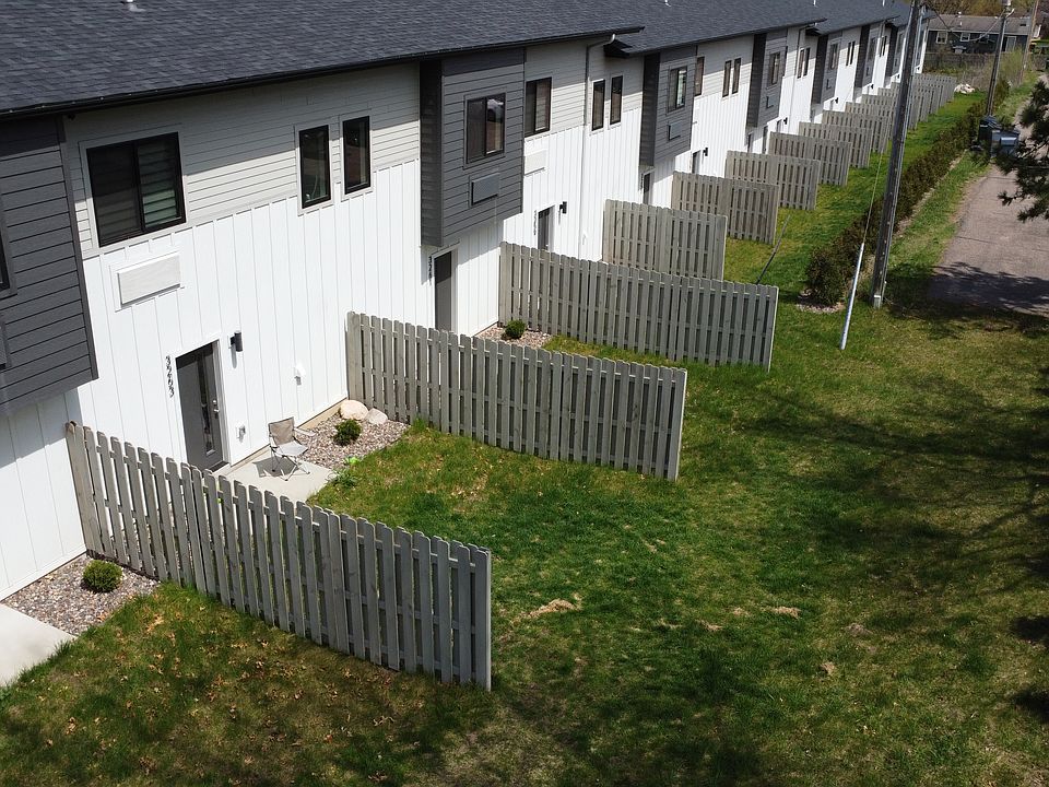 All units side by side with yard space