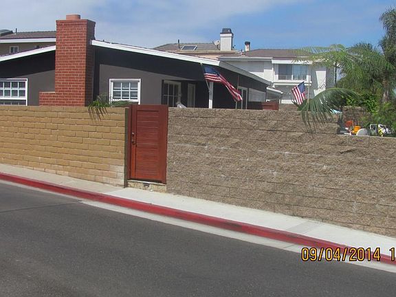 Walled security surrounds home